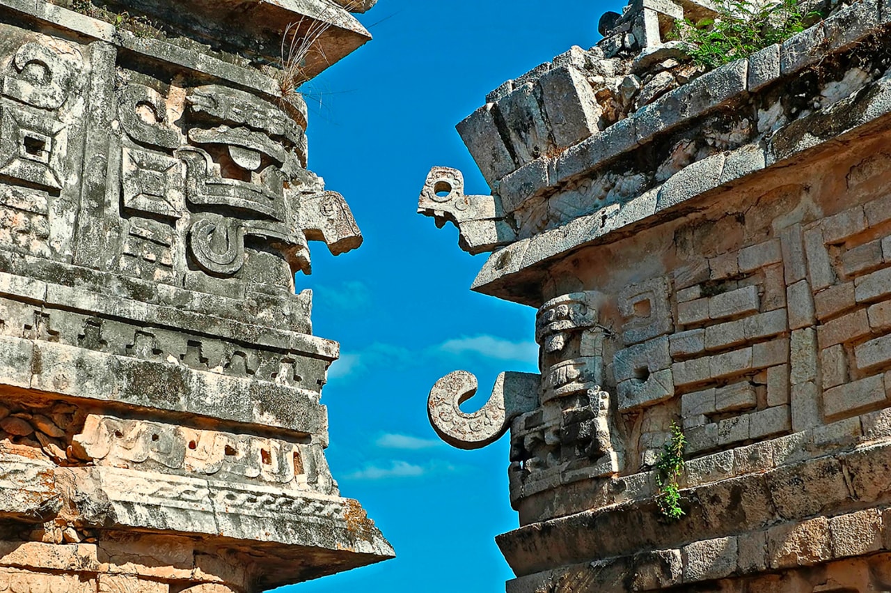 Close-up of intricate Mayan stone carvings at the La Casa de las Monjas temple, Chichen Itza